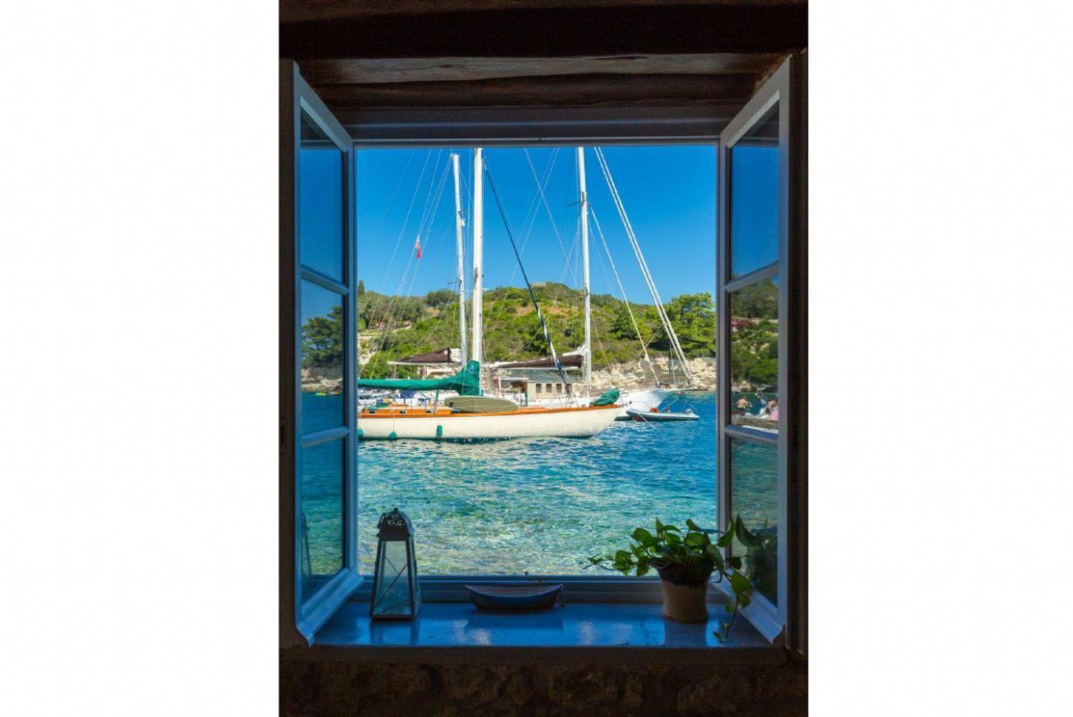 شقة Spiros Jetty House Longós المظهر الخارجي الصورة